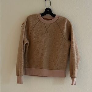 Everlane fleece sweater.